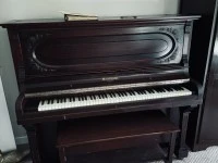 Mendesson upright 54" high, 27" deep, 57" wide piano